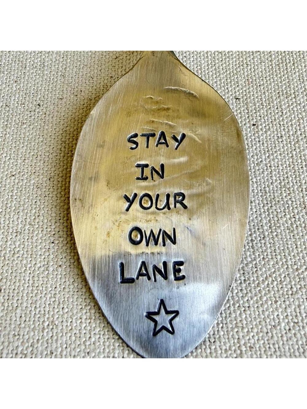 Hand stamped vintage silverplate spoon keychain made from a repurposed teaspoon.